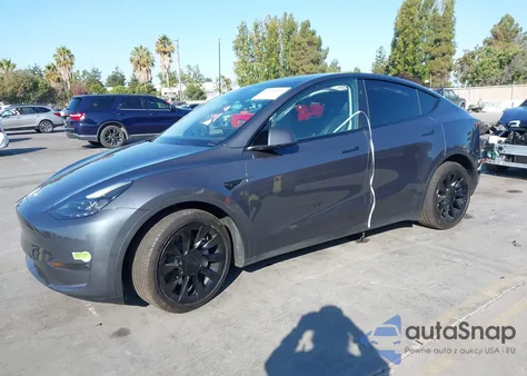 2023 Tesla Model Y Awd/Long Range Dual Motor All-Wheel Drive из США, поврежденный, VIN 7SAYGDEE3PF831212
